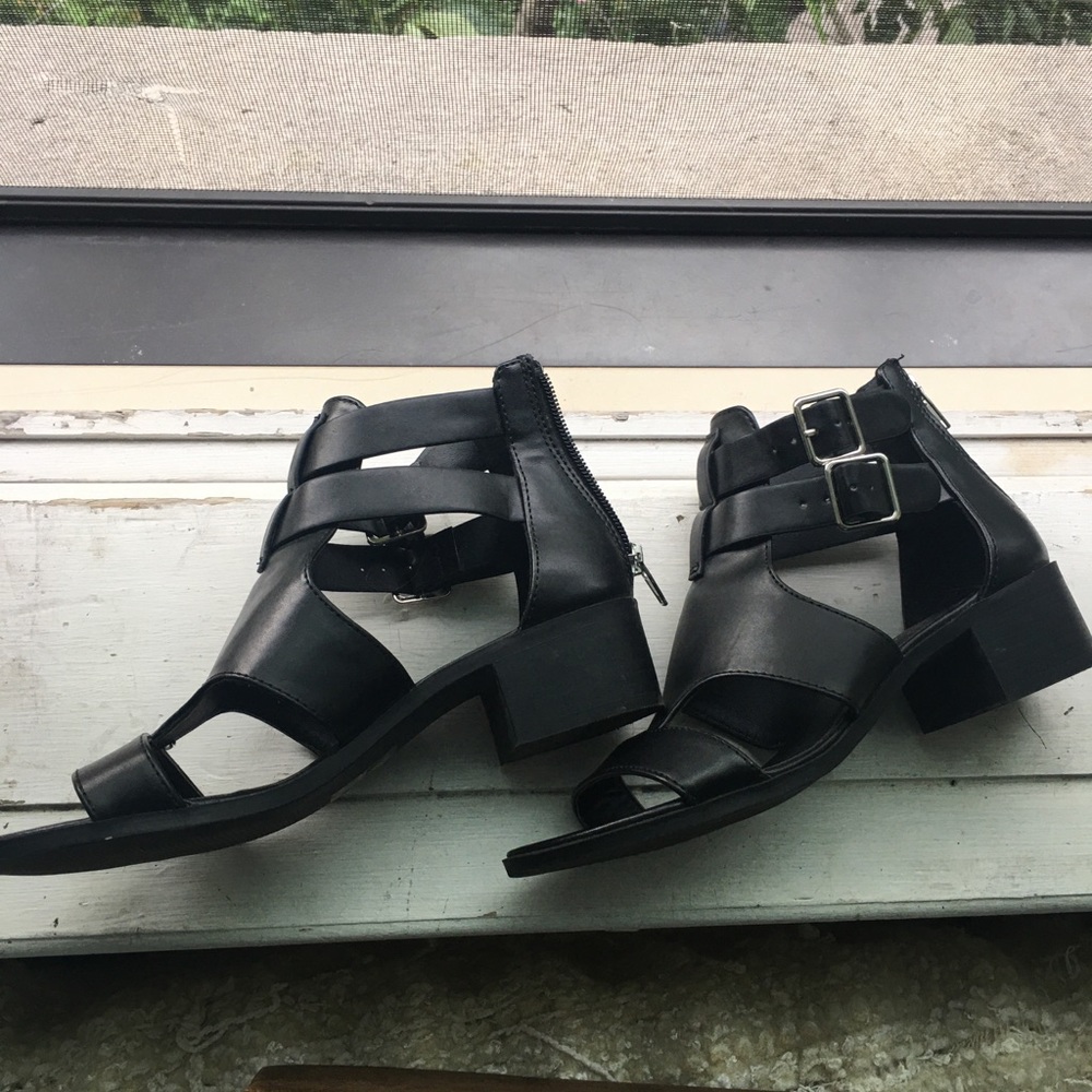 Fashionable black shoes with buckles